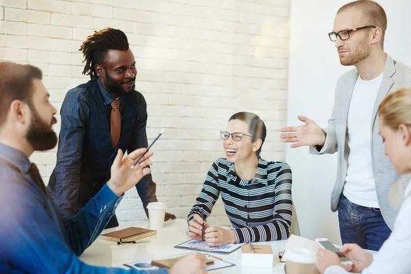 Cheerful Group Businesspeople Gathered Boardroom Analyzing Results Accomplished Project Notebooks — Stock Photo, Image