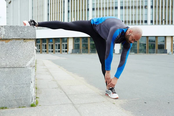 Sporty Guy Activewear Bending While Making Stretch Exercise — Stock Photo, Image