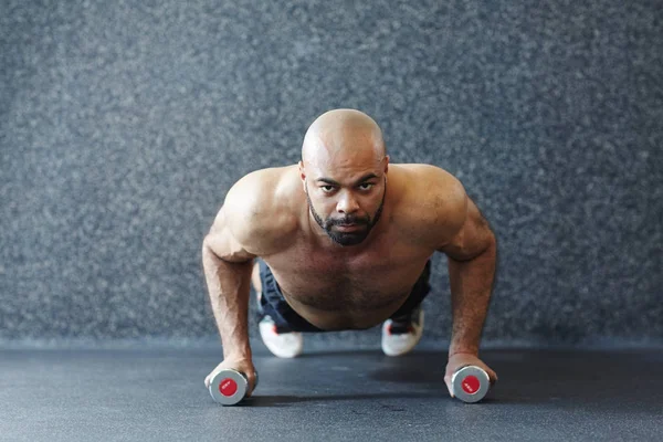 Young Man Dumbbells Doing Planks — Stock Photo, Image