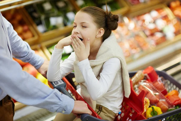 Portrait Little Tired Girl Yawning Sitting Shopping Cart While Parents — Stock Photo, Image