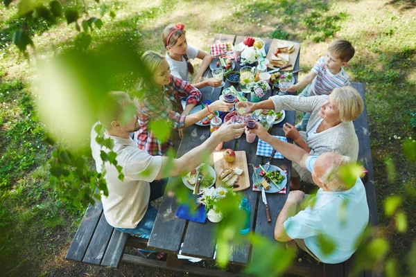 Young Senior Couples Cheering Red Wine Served Table — Stock Photo, Image