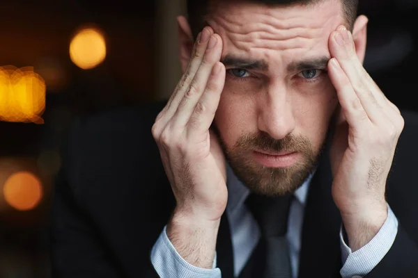 Portrait Modern Bearded Businessman Looking Camera Rubbing His Temples Stressed — Stock Photo, Image