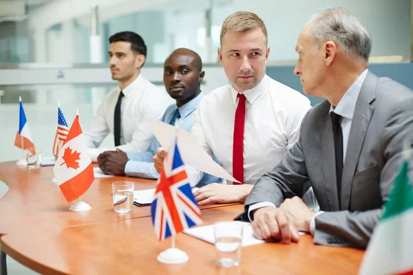 Mature Young Politicians Discussing International Document Forum — Stock Photo, Image