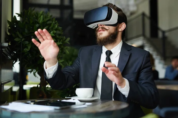 Curious Businessman Looking Virtual Reality Goggles — Stock Photo, Image