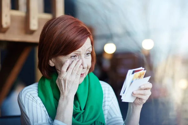 Woman Looking Photos Crying — Stock Photo, Image