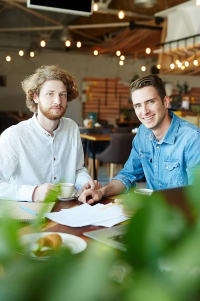 Young Economists Sitting Cafe Having Coffee Pastry Discussing Papers — Stock Photo, Image