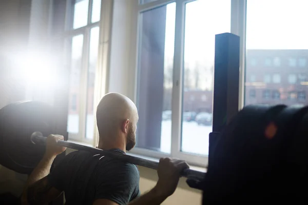 Back View Portrait Modern Bald Bearded Man Lifting Heavy Barbell — Stock Photo, Image