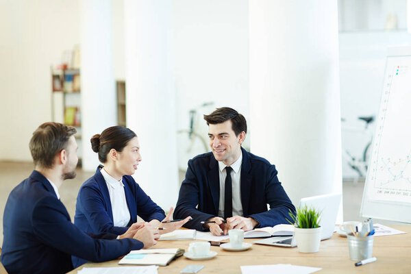 Business team interacting about new project