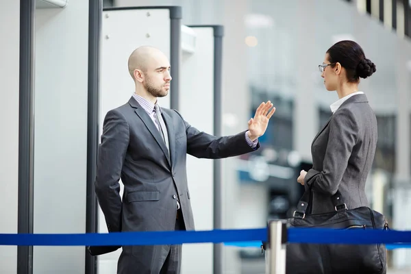 Young Airport Security Staff Stopping Young Traveler Hangbag Entrance — Stock Photo, Image