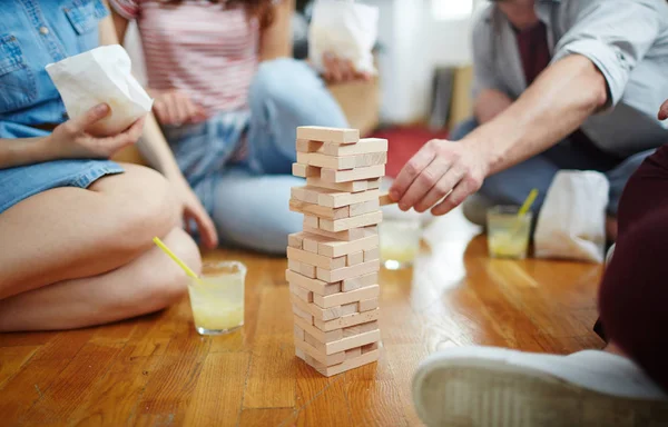 Tower Wooden Bricks Floor Several Friends Play — Stock Photo, Image