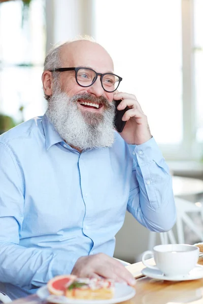 Mature Bearded Man Eyeglasses Speaking Smartphone While Sitting Cafe Cup — Stock Photo, Image