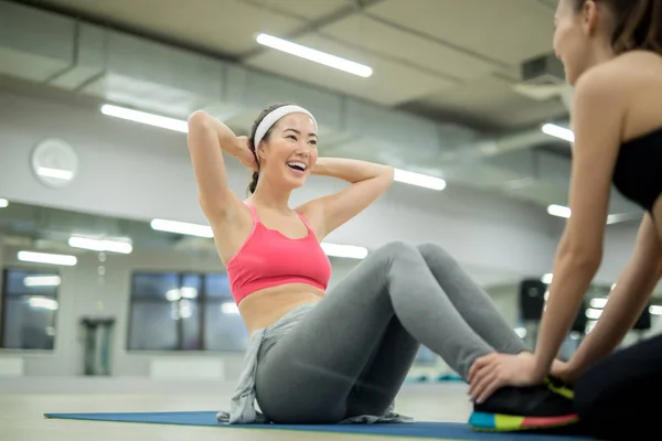 Young Active Female Doing Press Ups While Her Friend Trainer — Stock Photo, Image