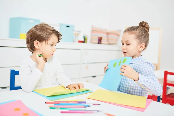 Little Girl Showing Her Drawing Elementary Schoolboy Telling Him Its — Stock Photo, Image