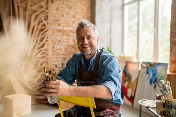 Cheerful Artist Workwear Sitting Chair Front Camera Looking You Smile — Stock Photo, Image