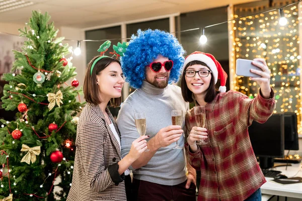 Three Young Office Workers Flutes Champagne Looking Smartphone Camera While — Stock Photo, Image