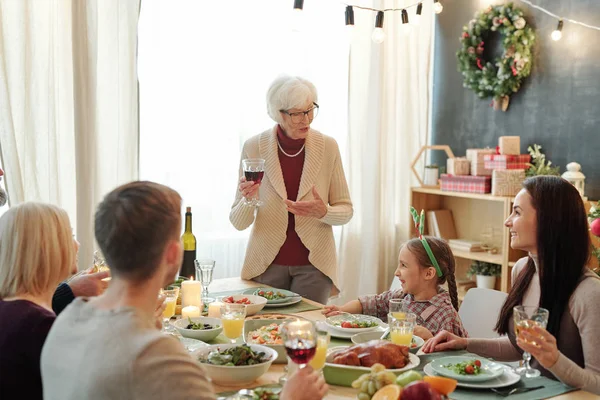 Senior Grey Haired Woman Glass Red Wine Pronouncing Thanksgiving Toast — Stockfoto