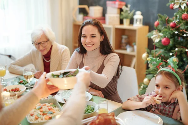 Happy Young Woman Taking Bowl Homemade Salad Hands Her Husband — Stok fotoğraf