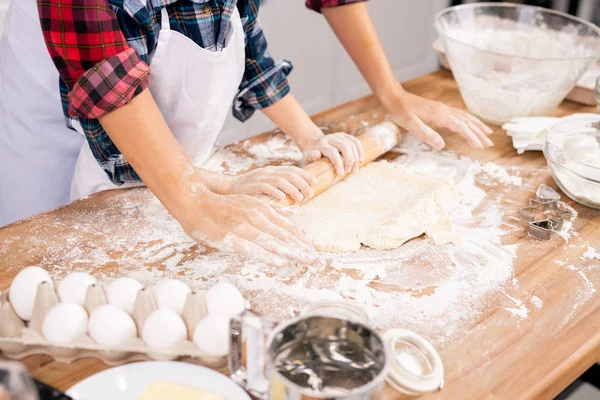 Hands Young Female Her Son Aprons Rolling Dough Wooden Table — Stok fotoğraf