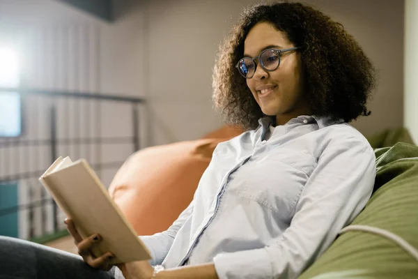 Happy Young Clever Female Student New Eyeglasses Reading Book While — Stockfoto