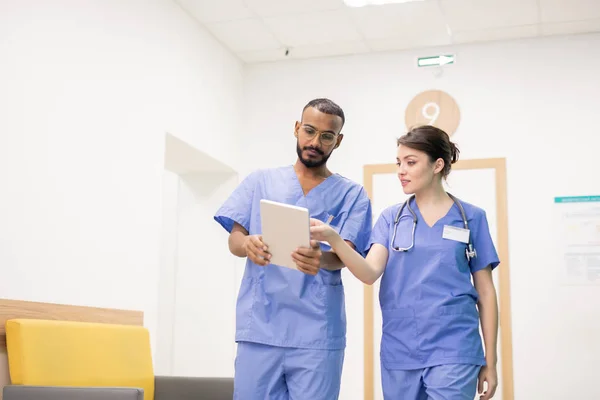 One Young Successful Clinicians Pointing Display Digital Tablet While Making — Stockfoto