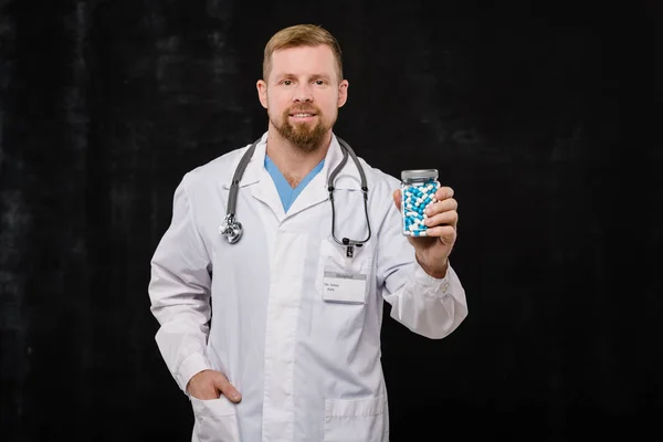 Happy Young Bearded Doctor Whitecoat Holding Bottle Pills Consultation Black — Stock Photo, Image