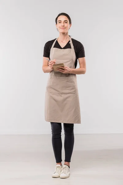 Pretty Brunette Waitress Workwear Making Notes Small Notepad While Standing — 스톡 사진