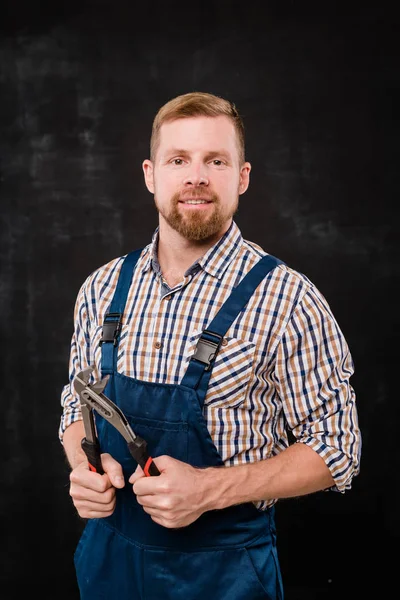 Bearded Technician Repairman Shirt Overalls Using Handtool Isolation Black Background — 스톡 사진