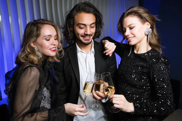 Three Happy Well Dressed Friends Toasting Flutes Champagne Night Club — Stock Photo, Image