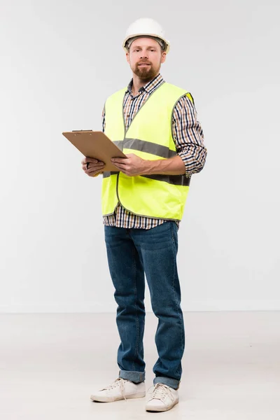 Bearded Young Engineer Clipboard Standing Front Camera Isolation Looking You — Stock Photo, Image