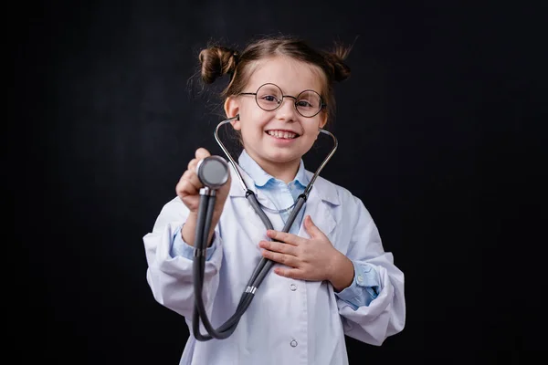 Cute Cheerful Little Girl Whitecoat Holding Stethoscope Front Camera While — Stock Photo, Image