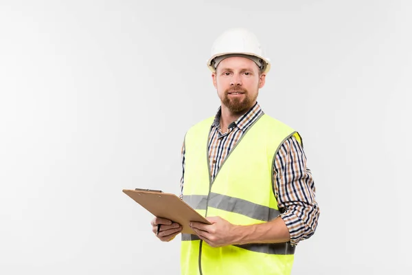 Cheerful Young Engineer Clipboard Looking You While Standing Front Camera — Stock Photo, Image