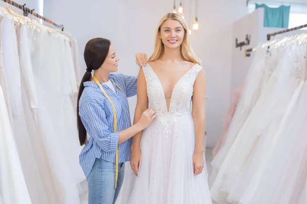 Smiling Wedding Dress Tailor Tape Measure Adjusting Gown Fitted Young — 스톡 사진