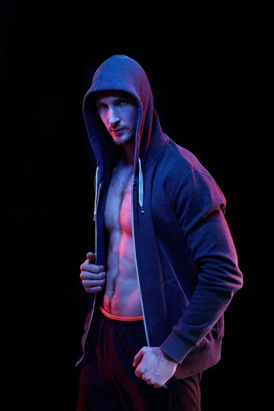 Young Male Muscular Athlete Unzipped Hoodie Standing Darkness Black Background — Stock Photo, Image