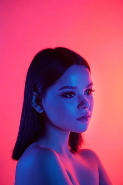 Serious Pretty Brunette Woman Naked Shoulders Looking Away Neon Pink — Stock Photo, Image