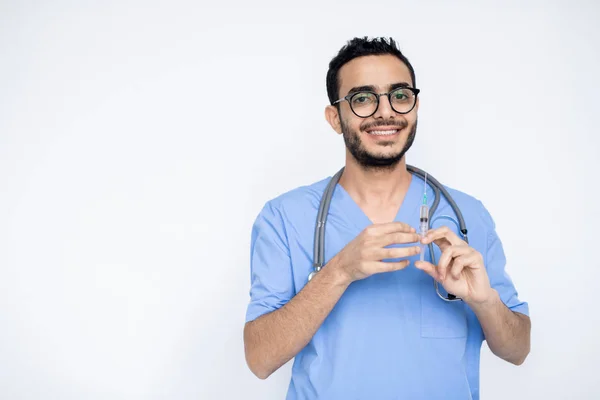 Happy Young Male Clinician Toothy Smile Holding Syringe While Going — 스톡 사진