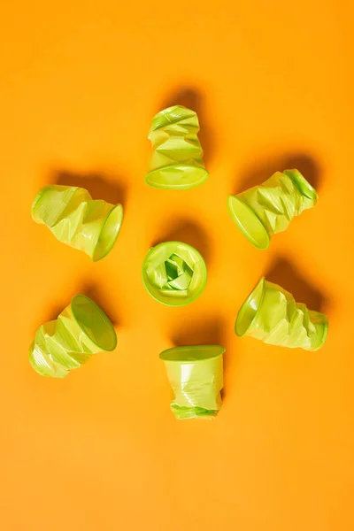 Vertical Flat Lay Pattern Shot Used Light Green Plastic Cups — Stok fotoğraf