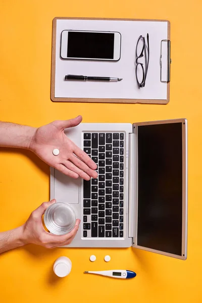 Unrecognizable Person Taking Pill While Working Office Vertical Flat Lay — Stockfoto