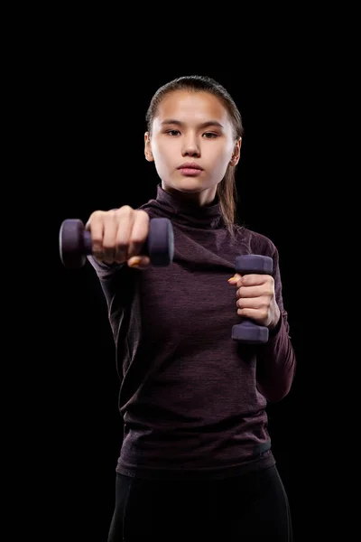 Young Active Female Dumbbells Stretching Arm Forwards While Exercising Black — Stock Photo, Image