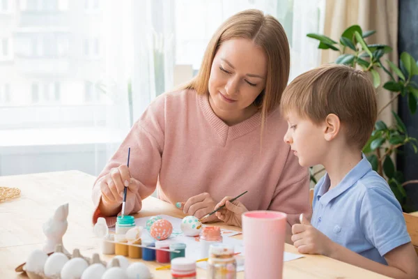 Attractive Young Mother Son Painting Eggs Bright Colors While Preparing — Stock Photo, Image