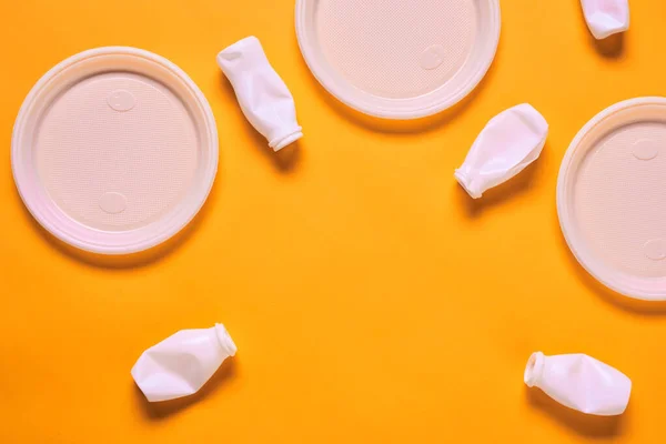 Horizontal Flat Lay Composition White Plastic Empty Plates Bottles Orange — Stok fotoğraf