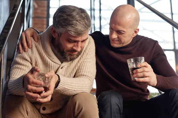 Bald Man Turtleneck Sitting Whisky Glass Stairs Supporting Friend Depression — Stock Photo, Image