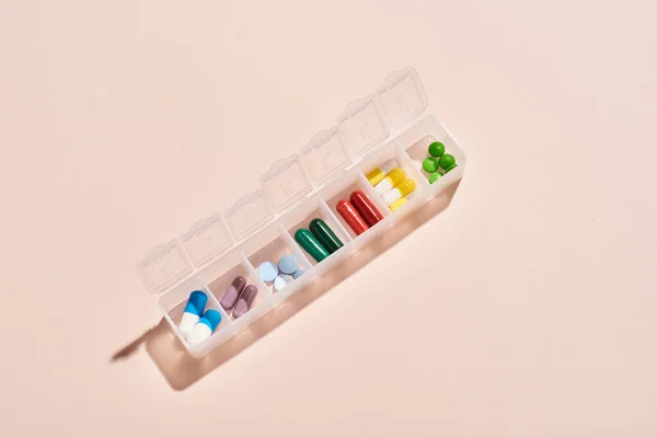 Horizontal Shot Portable Plastic Container Drugs Medicaments Pale Pink Background — Stok fotoğraf