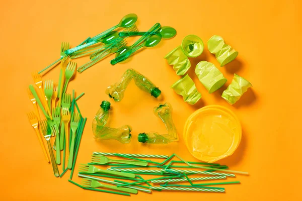 Horizontal Flat Lay Shot Recycling Symbol Made Out Empty Plastic — Zdjęcie stockowe