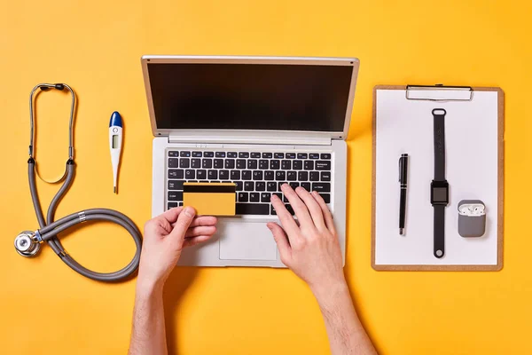 Unrecognizable Doctor Buying Something Online Shop Using Credit Card Horizontal — Stock fotografie