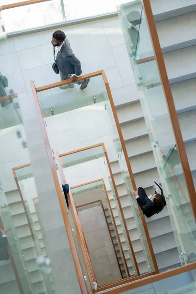 View Modern Business People Moving Stairway Office Center While Coming — Stock Photo, Image