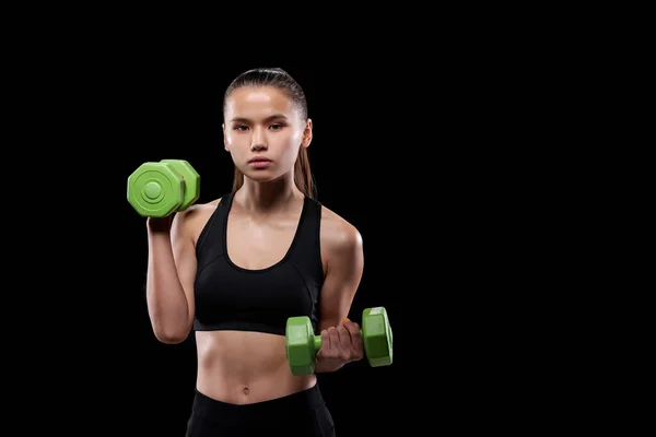 Pretty Fit Girl Black Activewear Holding Green Dumbbells While Exercising — Stock Photo, Image