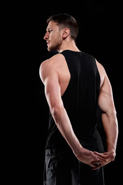 Rear View Young Sportsman Black Activewear Exercising Isolation His Hands — Stock Photo, Image
