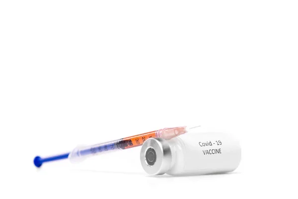 Close Filled Syringe Leaning Bottle Covid Vaccine White Background — Stock Photo, Image