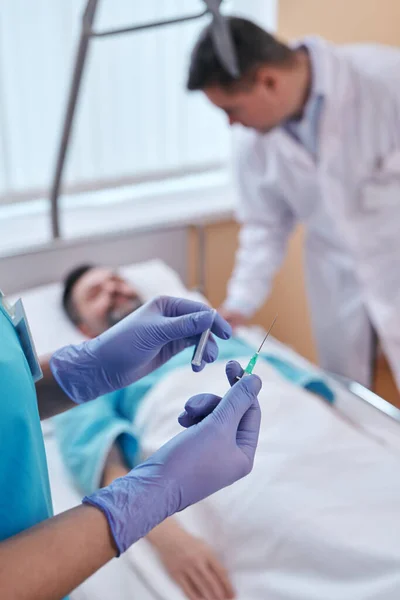 Close Nurse Surgical Gloves Standing Patients Bed Preparing Syringe Needle — Stock Photo, Image