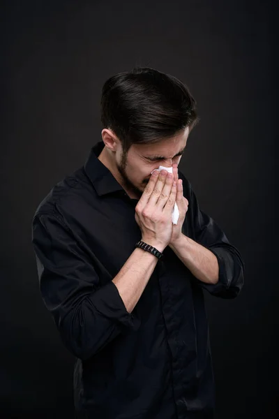 Ill Young Brunette Man Coronavirus Cold Symptom Sneezing Napkin Black — Stock Photo, Image